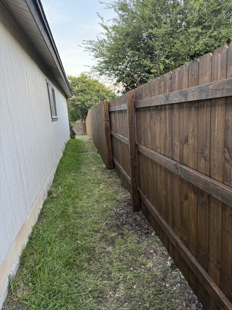 Cedar privacy fence, stained finish