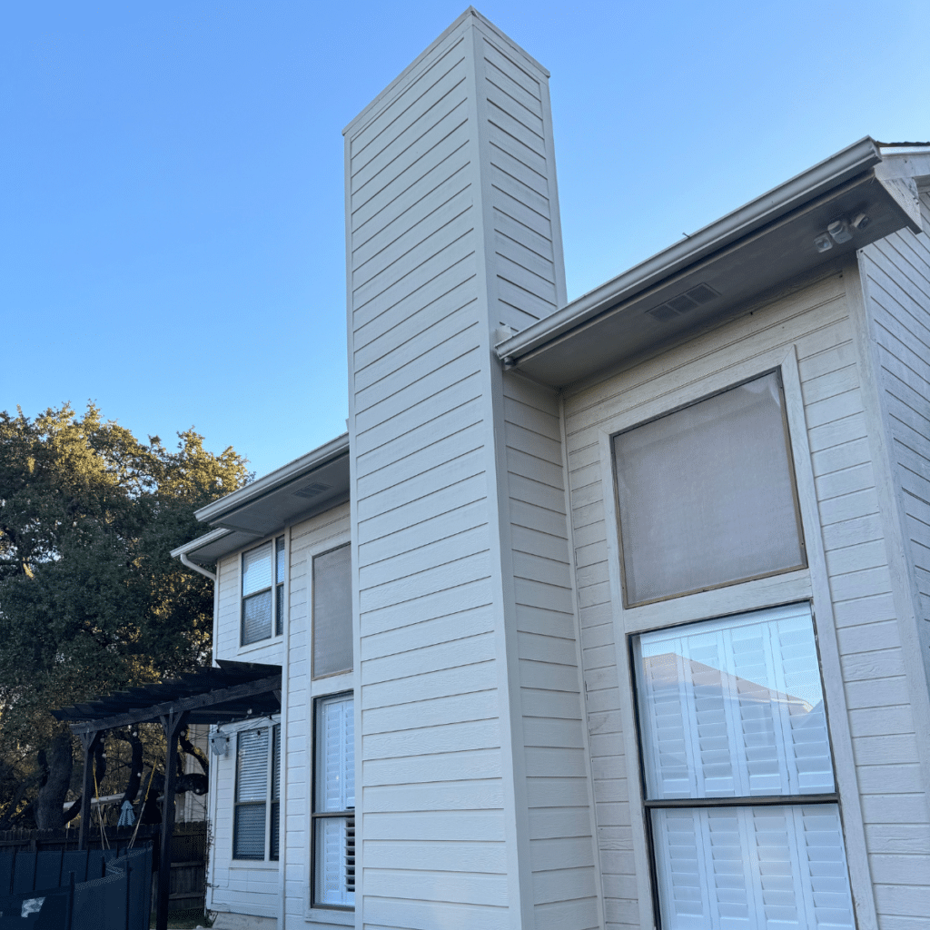 Chimney chase siding on a San Antonio-area home exterior
