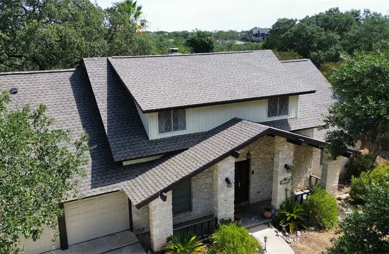 Aerial view of a home with a completed roof