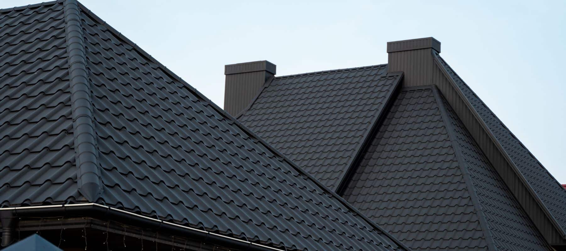 closeup of an all black tile roof