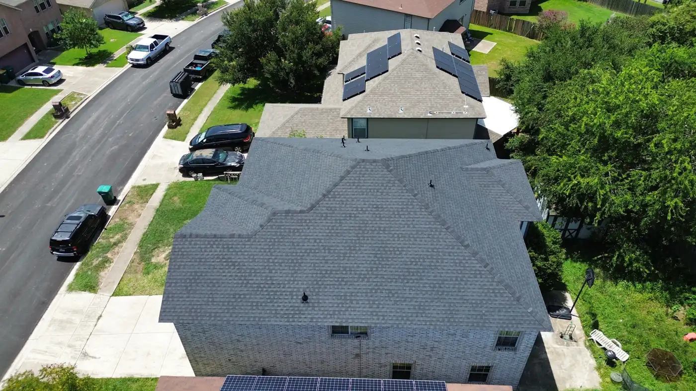 Completed architectural shingle roof replacement in Live Oak, TX — drone view of the finished installation by Holmes Roofing, July 2025