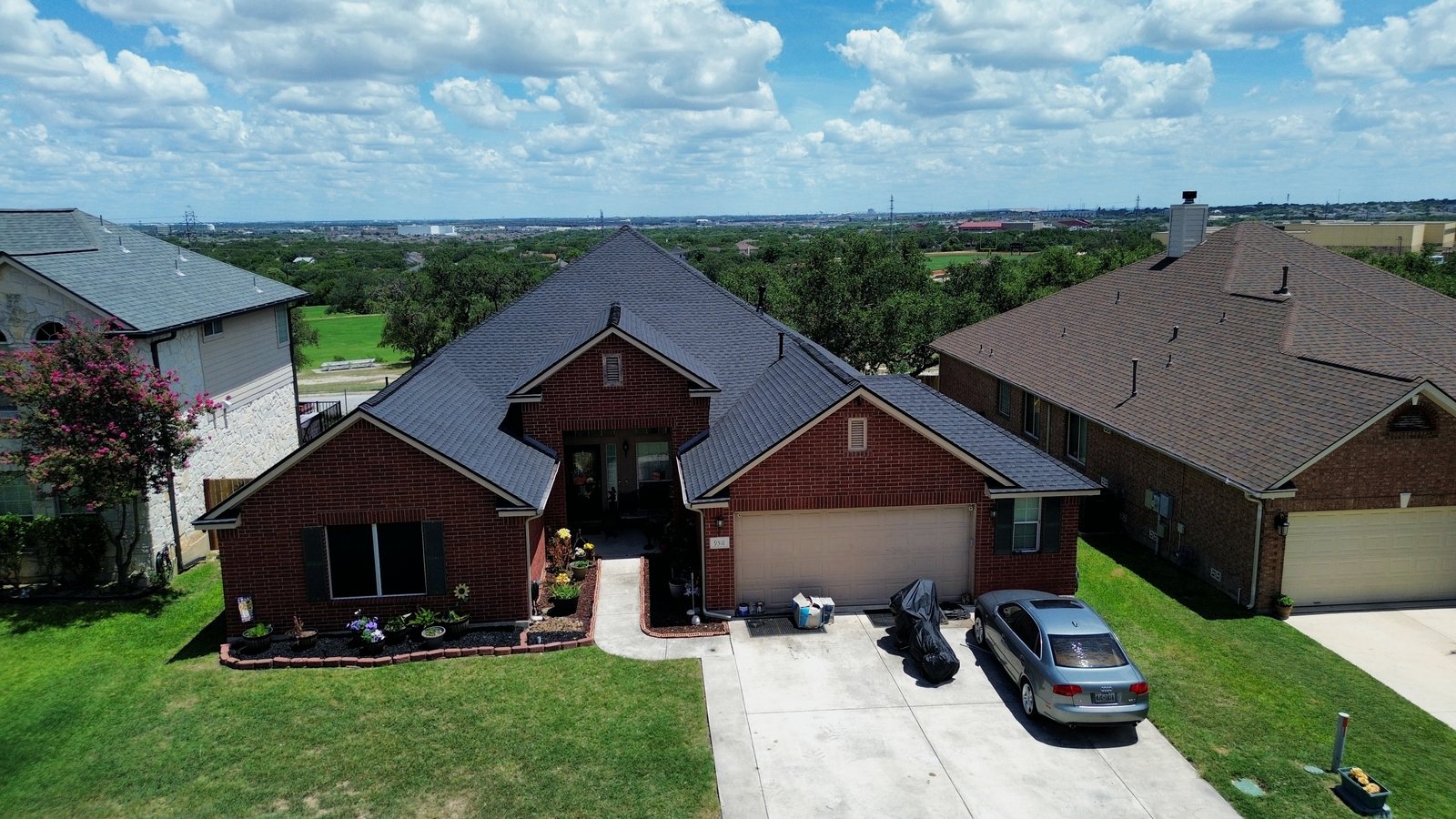 Completed shingle roof, aerial view