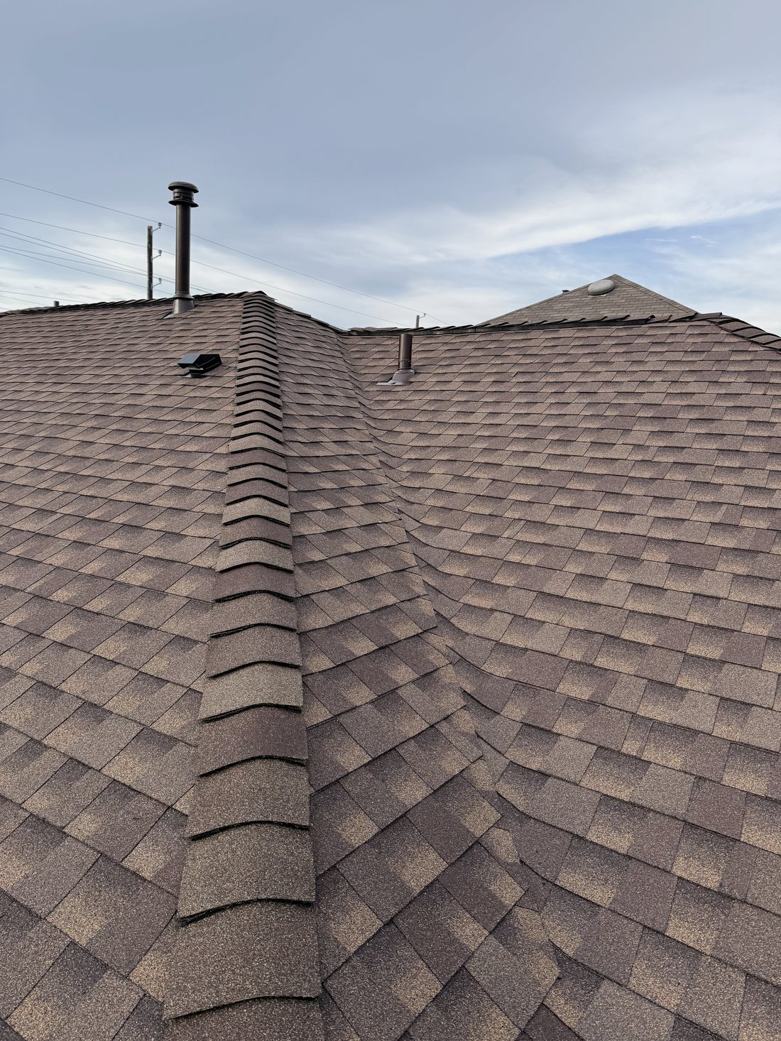 Ridge cap shingle craftsmanship close-up